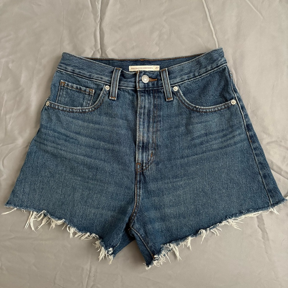 Levi’s Mom High Waisted Frayed Denim Shorts